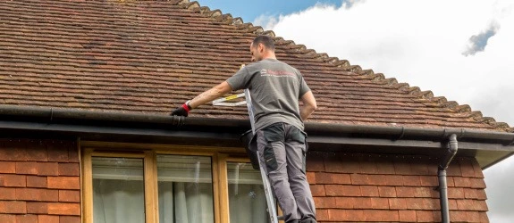 Gutter cleaning a residential property in West Midlands
